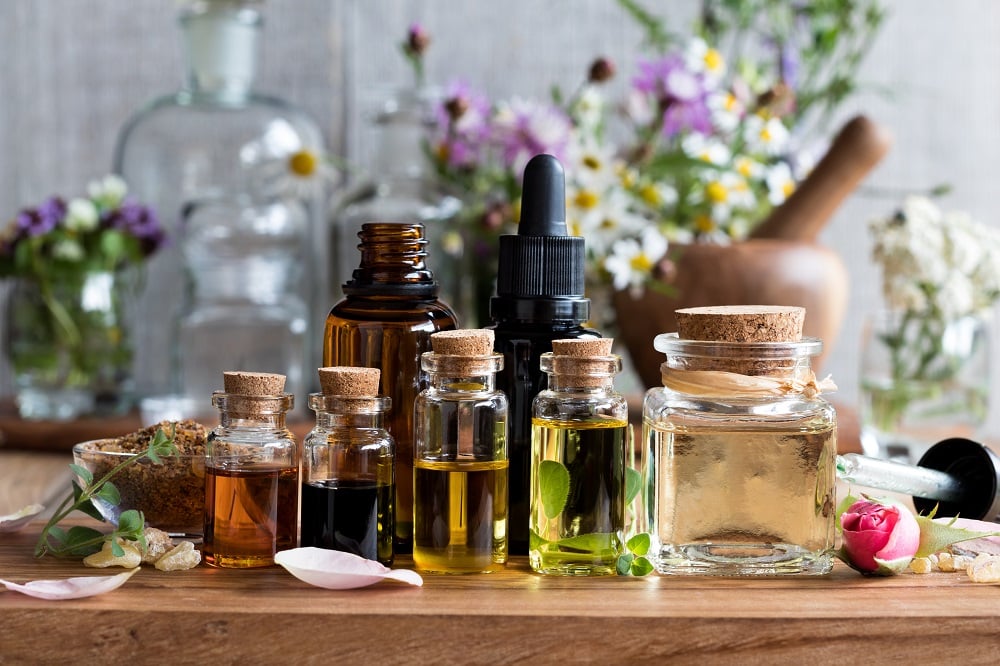 Selection,Of,Essential,Oils,,With,Herbs,And,Flowers,In,The