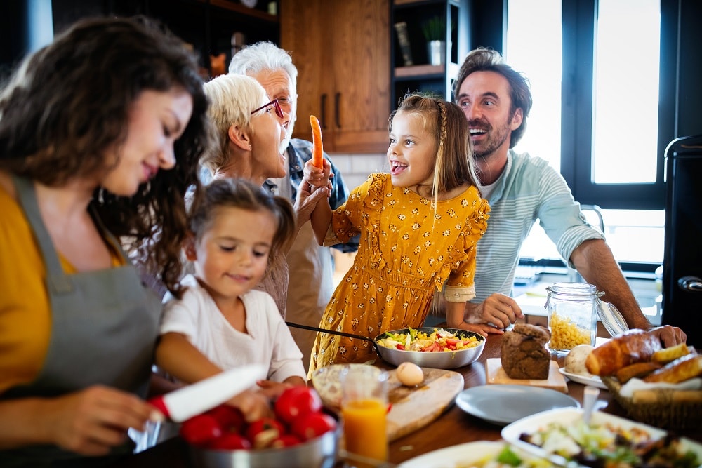 Portrait,Of,Happy,Family,In,Kitchen,At,Home