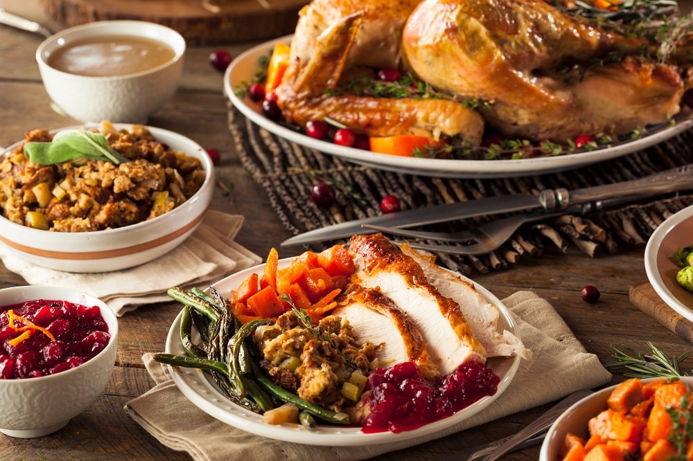 Full,Homemade,Thanksgiving,Dinner,With,Turkey,Stuffing,Veggies,And,Potatos