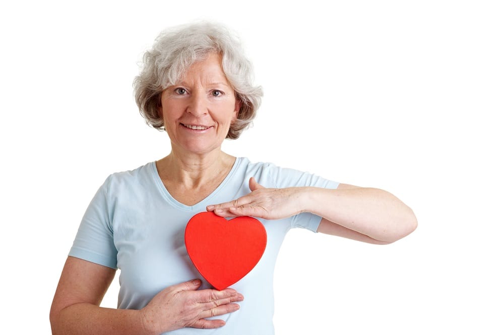 Happy,Healthy,Elderly,Woman,Holding,A,Red,Heart