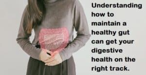 Woman,Hands,On,Her,Stomach,With,Intesline,,Probiotics,Food,For