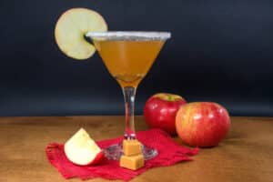 Apple,Cider,Martini,With,Caramel,Apples,And,Ripe,Apples,On
